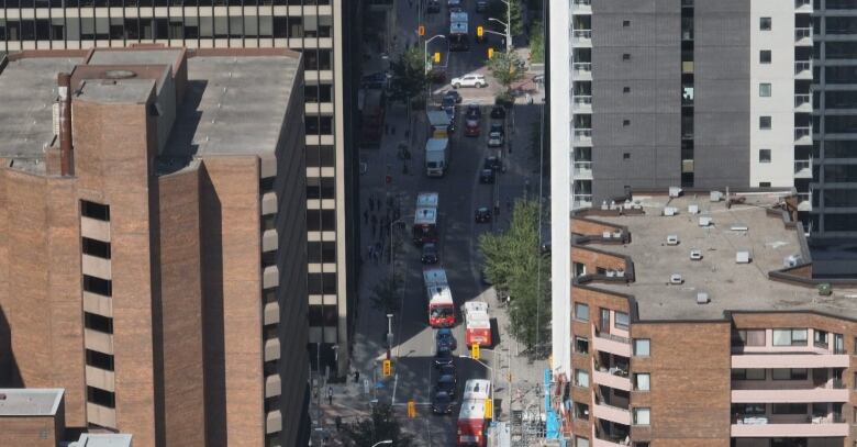 Buses navigate through traffic