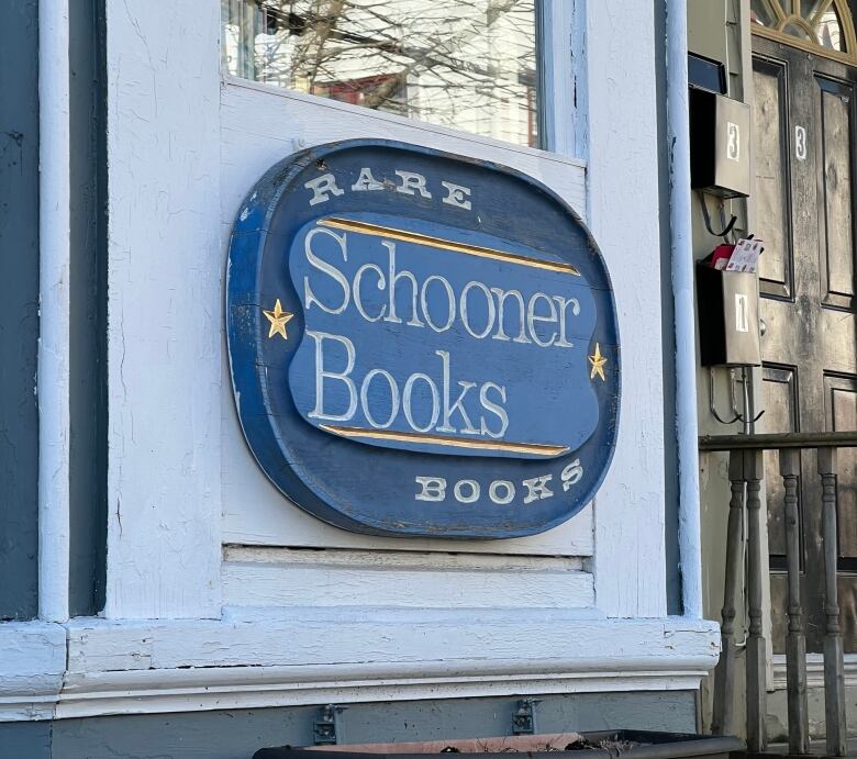 A sign for Schooner Books