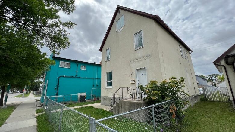 The outside of a two-storey house.