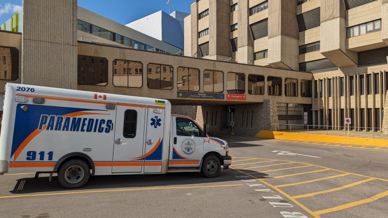 An ambulance parked outside a hospital