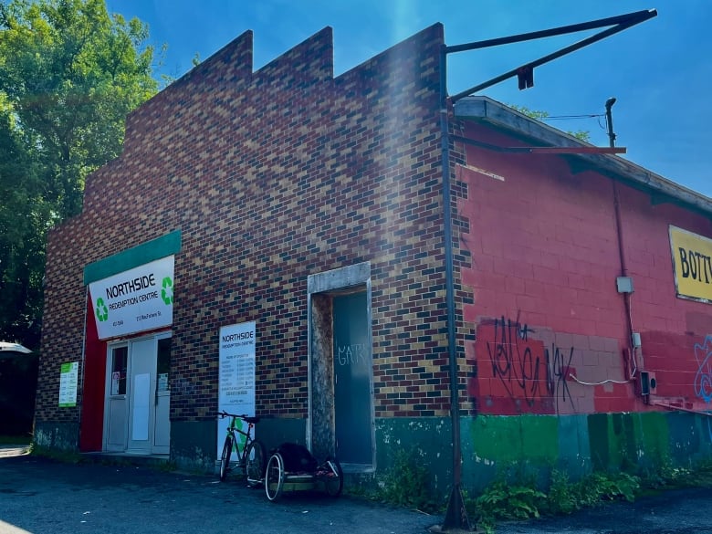 A large brick building with the sign 'Northside Redemption Centre.'