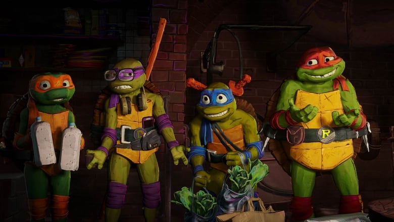 Cartoon animated turtles Mikey, Donnie, Leo and Raph try to talk their way past Master Splinter after an adventure on a midnight grocery run in a scene from Teenage Mutant Ninja Turtles: Mutant Mayhem