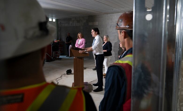 Prime Minister Justin Trudeau speaks during a visit to an apartment complex under construction in Hamilton, Ont., Monday, July 31, 2023. 