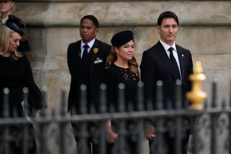 Trudeau and Grgoire Trudeau leave Westminster Abbey after the funeral service for Queen Elizabeth II in central London on Monday, Sept. 19, 2022.