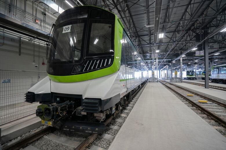 A train in a concrete building.