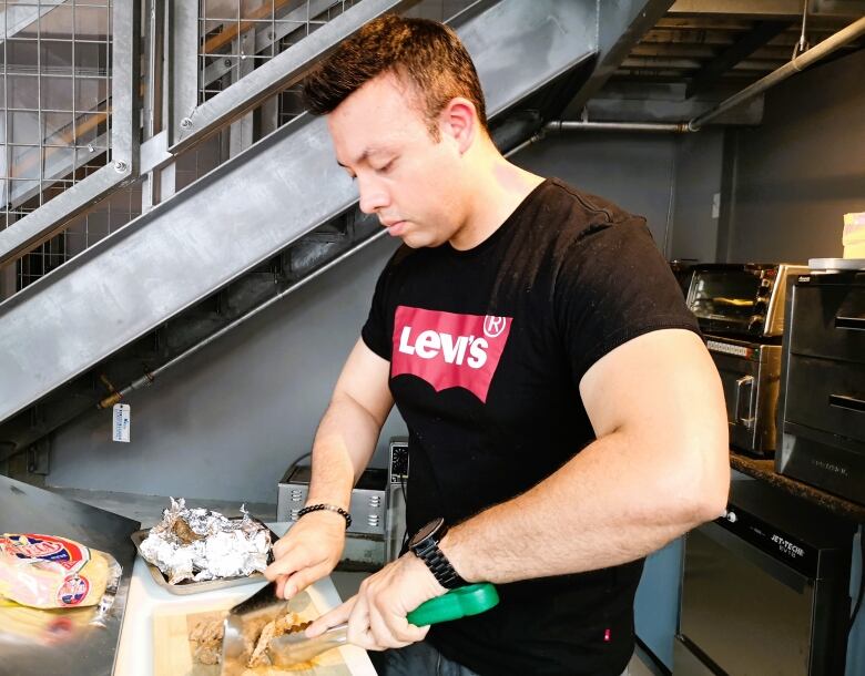 Chef Fernando Toro prepares ingredients for carne asada tacos