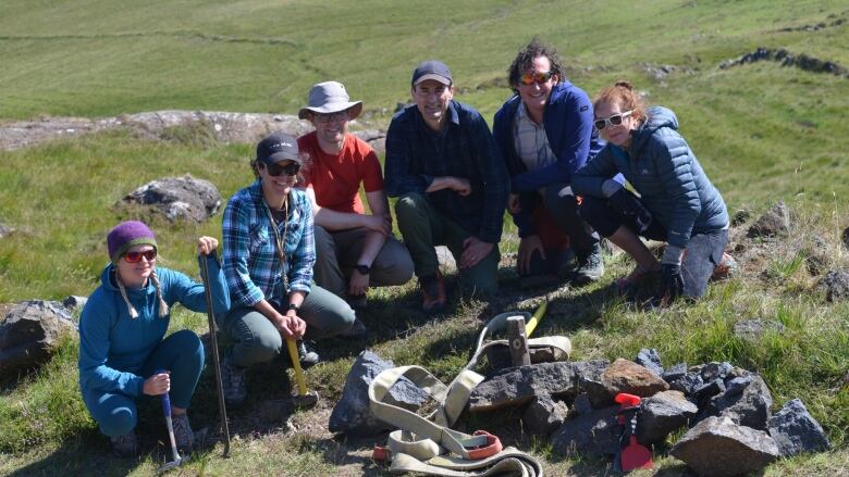 Scientists at a dig. 