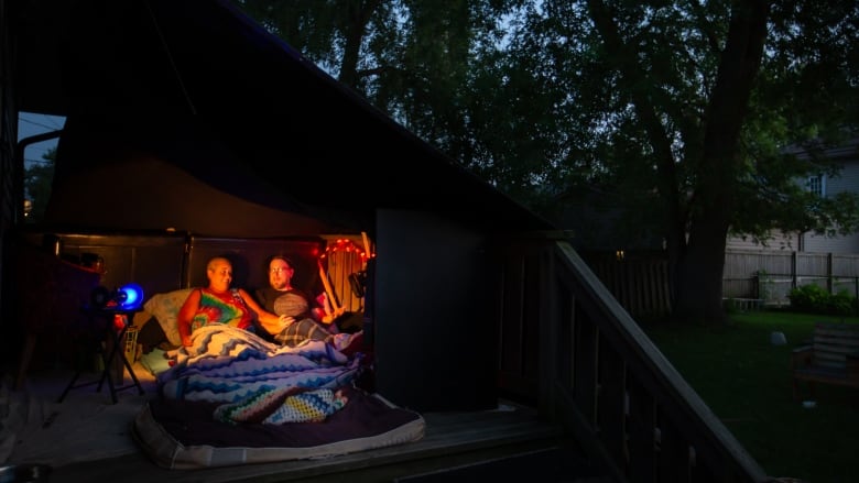 Reidy and Rousseau's outdoor fort, which the couple built on their backyard deck to use as their bedroom during the summer months.