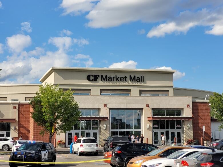 Market mall in Calgary is visible in this shot that also has a police car.