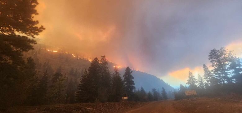 A wildfire over the hills.