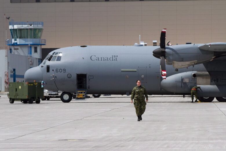 Several CC-130J Hercules transport aircraft sit on the tarmac at CFB Trenton in Trenton, Ont., on Wednesday, May 4, 2016. The military are sending pre-operation troops to help out with wildfires in Fort McMurray, Alberta. The plane will land at CFB Cold Lake, Alberta. 