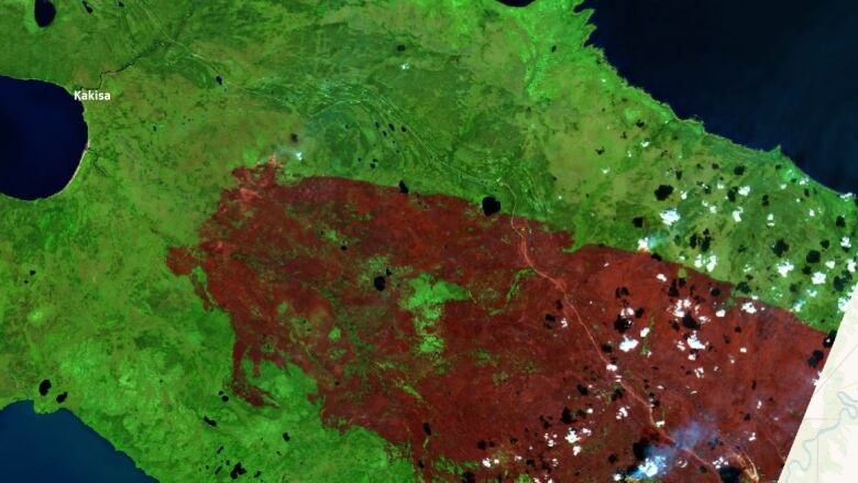 Sat imagery shows burn area between Hay River and Kakisa.