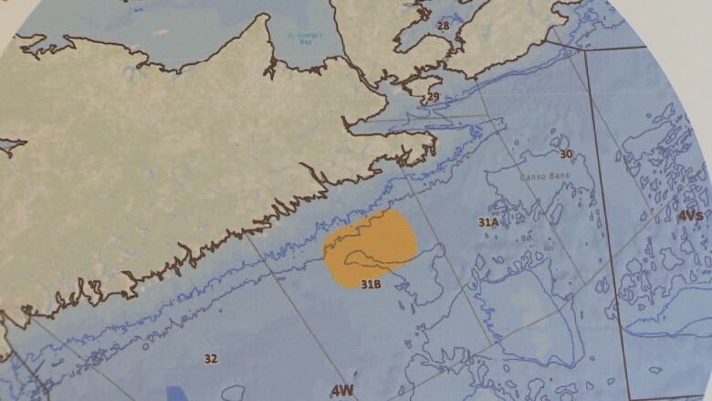 A map shows the eastern part of Nova Scotia and there is a highlighted area in the water off the eastern shore. 