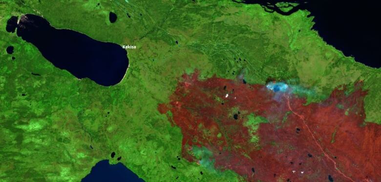 Satellite imagery shows a big brown blob to the right of a community, next to the mouth of a river.