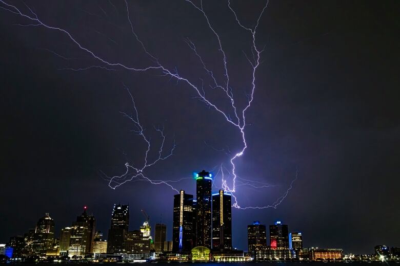 Lightning strike is captured over the General Motors building in downtown Detroit in Aug. 25, 2023. 