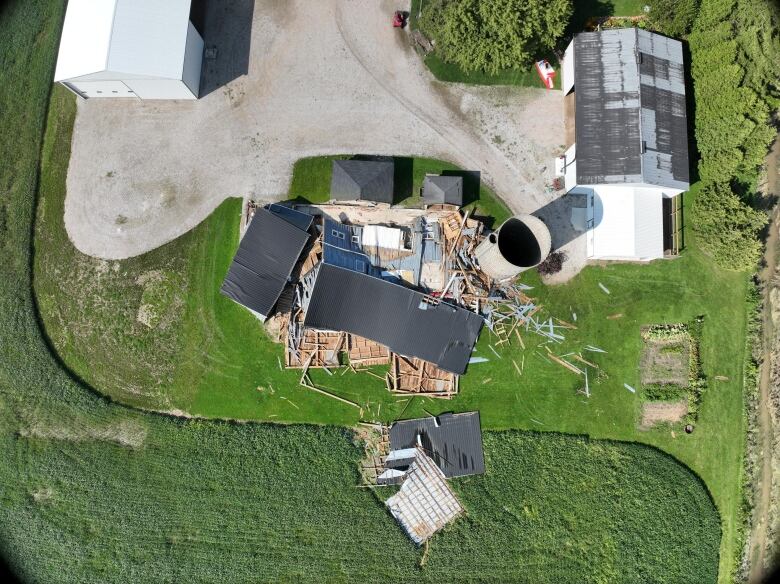 Aerial view of damage to a barn that collapsed after being hit by a tornado in Tecumseh, Ont., Aug. 24, 2023.