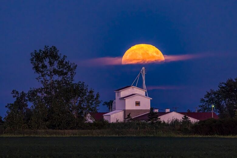 Super blue moon is shown from Windsor-Essex, Ont., Aug. 30, 2023.