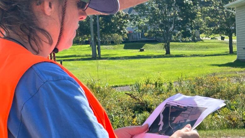 A search volunteer looks at a map of the Montague area.