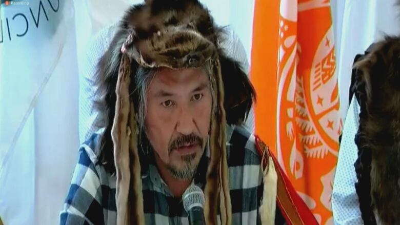  Athabasca Chipewyan First Nation Chief Allan Adam speaks to reporters.