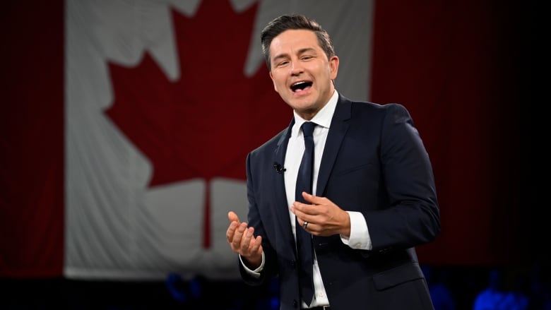 Conservative Leader Pierre Poilievre is pictured on stage at the Conservative party convention.