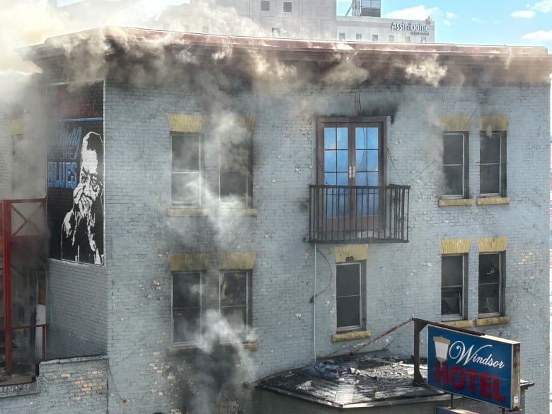 Smoke billowing out of the vacant Windsor Hotel Wednesday morning in winnipeg. 