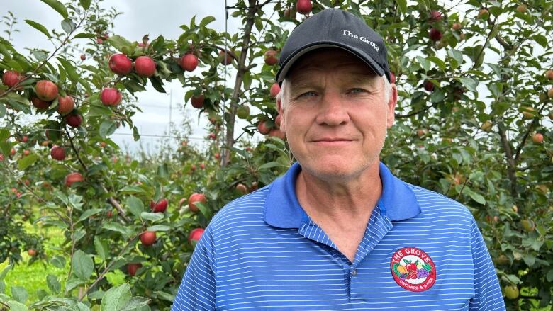 Geoff Boyle in his orchard.