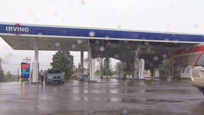 An Irving gas station where the roof is falling in