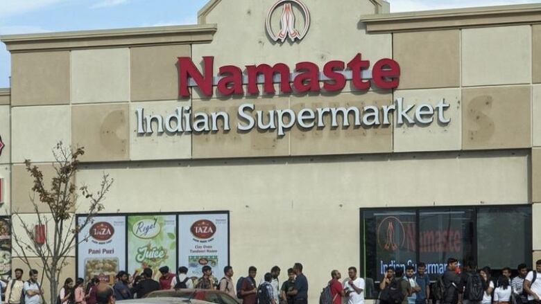 Hundreds of international students stood in line for hours to apply for seven positions at a South Asian supermarket in Windsor, Ont.