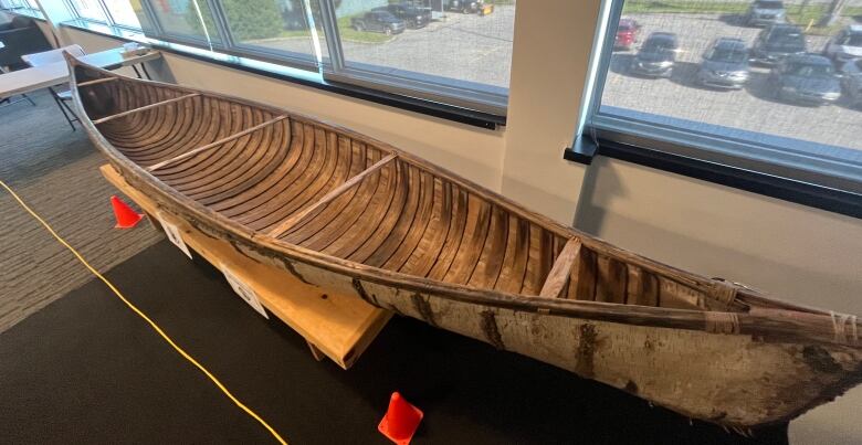 A birchbark canoe.