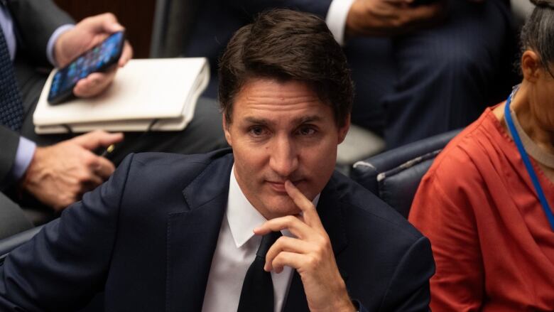 Prime Minister Justin Trudeau listens to a speaker as he participates in the United Nations Secretary Generals Climate Ambition Summit at the United Nations, in New York, Wednesday, Sept. 20, 2023. THE CANADIAN PRESS/Adrian Wyld