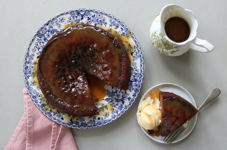 A cake on a plate with Early Grey tea around. 