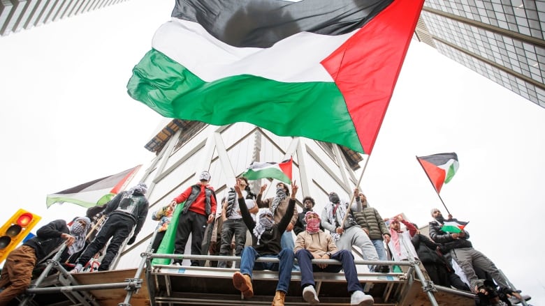 Palestinian supporters hold a rally in Downtown Toronto on Oct. 9, 2023.