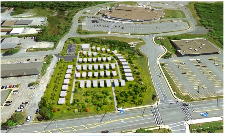 A rendering of a tiny-home community featuring little white houses surrounded by green space.