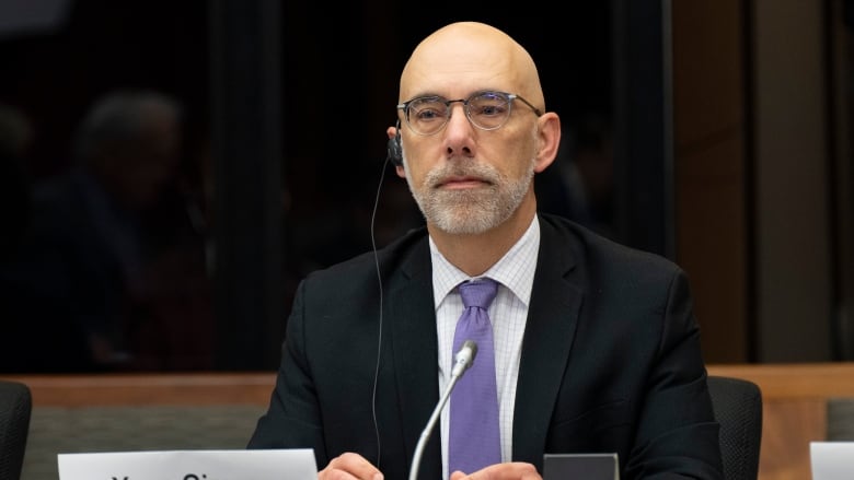 Parliamentary Budget Officer Yves Giroux waits to appear before appearing at the Senate Committee on National Finance, Tuesday, October 25, 2022 in Ottawa.