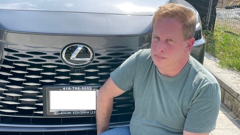 Mitchell Levine with the Lexus he bought in July. Two months after the dealership told him he had to remove his after-market safety device, the vehicle in this photo was stolen.