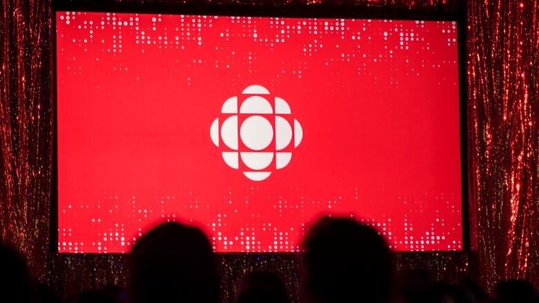 The CBC logo is projected onto a screen in Toronto on May 29, 2019.