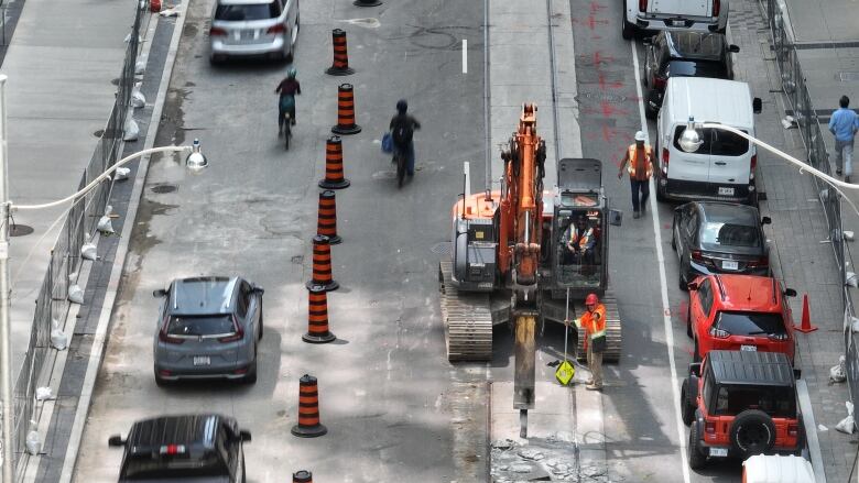 Road Construction at Adelaide St. W and York, concrete demolition, road construction/closures and traffic.