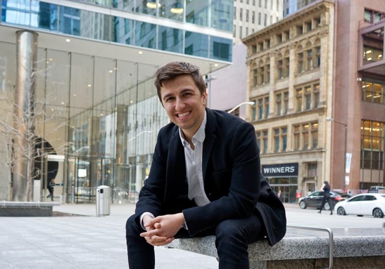 Lawyer sitting in urban landscape.