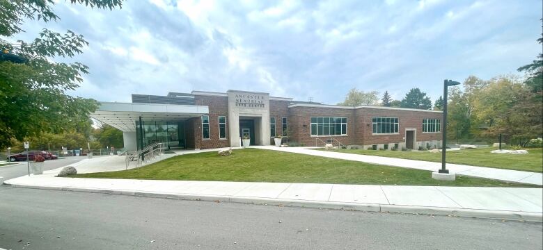 A wide, brick faced building