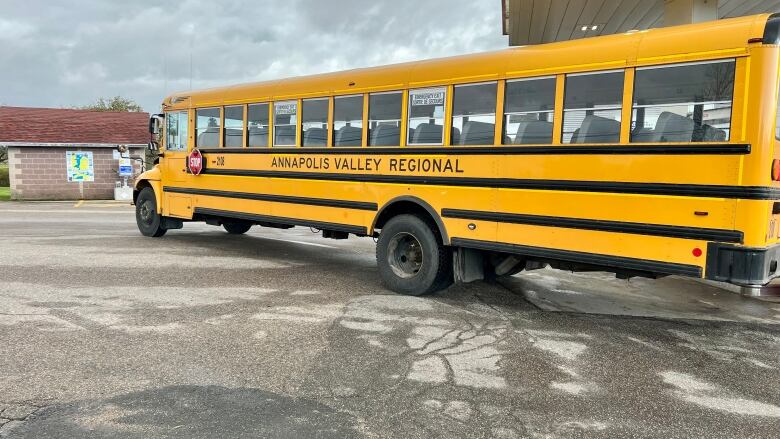 A yellow school bus with the words 