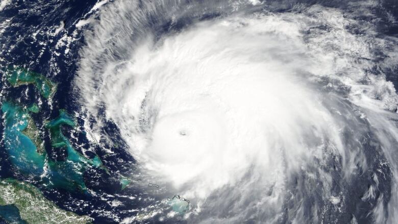 Swirling clouds in a satellite image over the Atlantic Ocean.