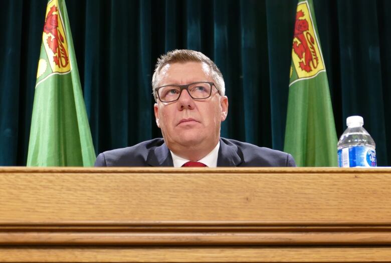 Saskatchewan Premier Scott Moe looks towards the media during a press conference on Bill 137. 