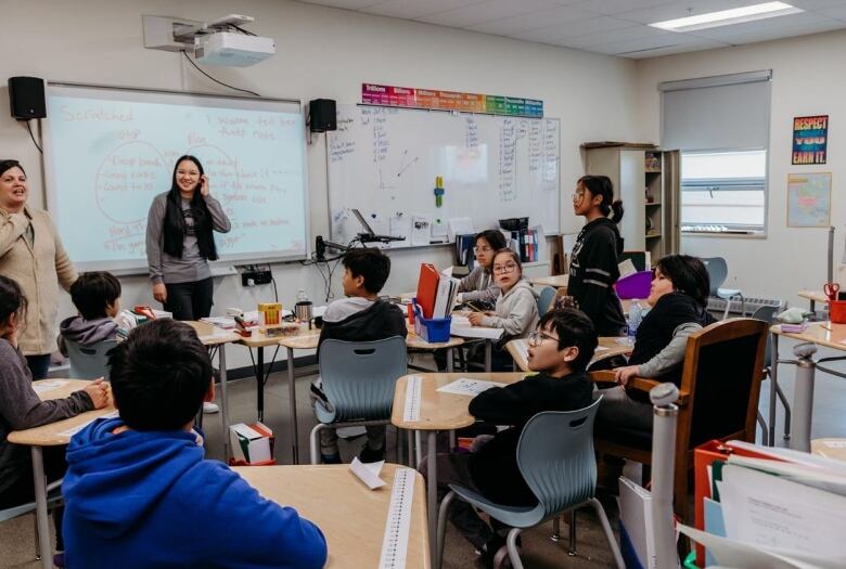 A group of Cree students sit at their desks in a classroom in northern Quebec. 