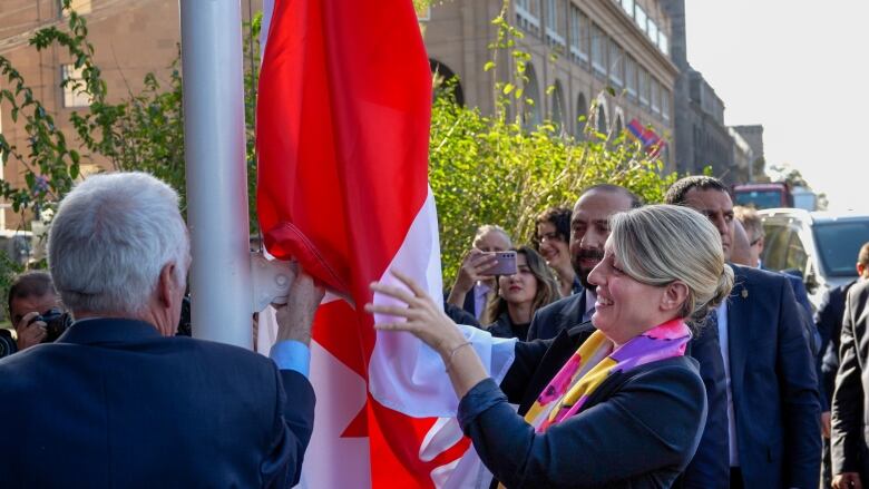 A minister with a flag. 