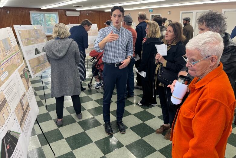 people standing at a meeting