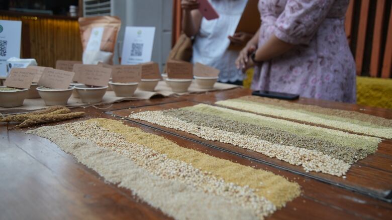 Different varieties of millet on display at a bar in Mumbai, India.