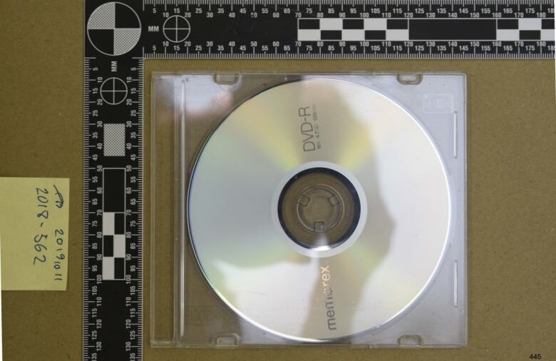 A photo of a DVD recovered from Salim Henareh, which contained FINTRAC documents. According to the agreed statement of facts, he told police he had received the package in March 2015. 