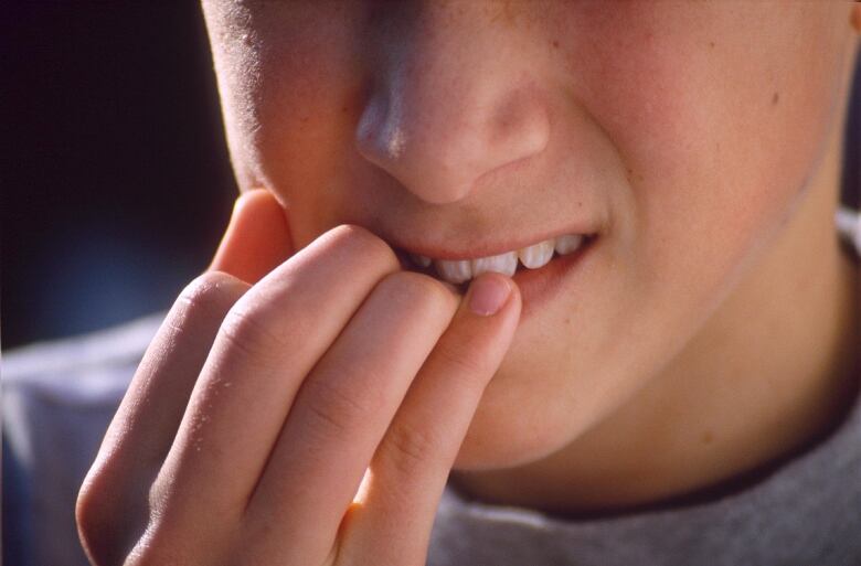 Mandatory Credit: Photo by David Lapper/Shutterstock (285332a) TEENAGER BITING NAILS - MODEL RELEASED TEENAGERS - 1998