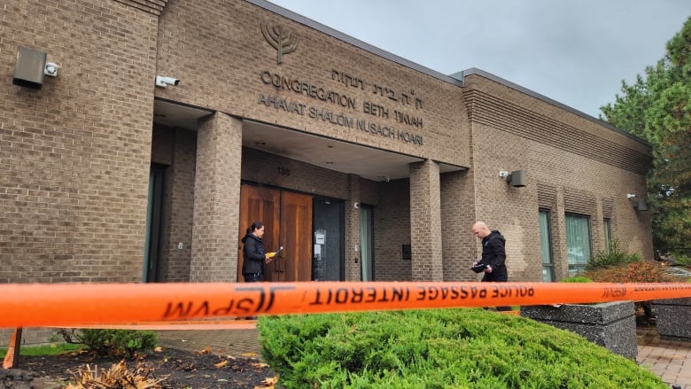 police tape in front of synagogue. 