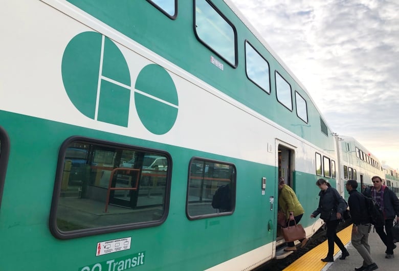 People boarding a GO train.